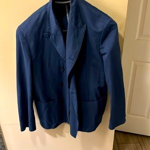 Dress jacket. Don’t need no more. Has pocket on the inside for valuables.